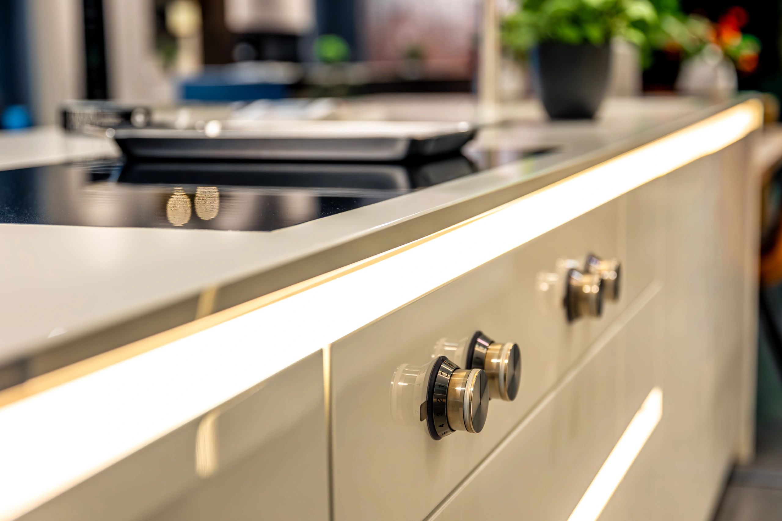 Luxury kitchen island with integrated lighting and cooktop